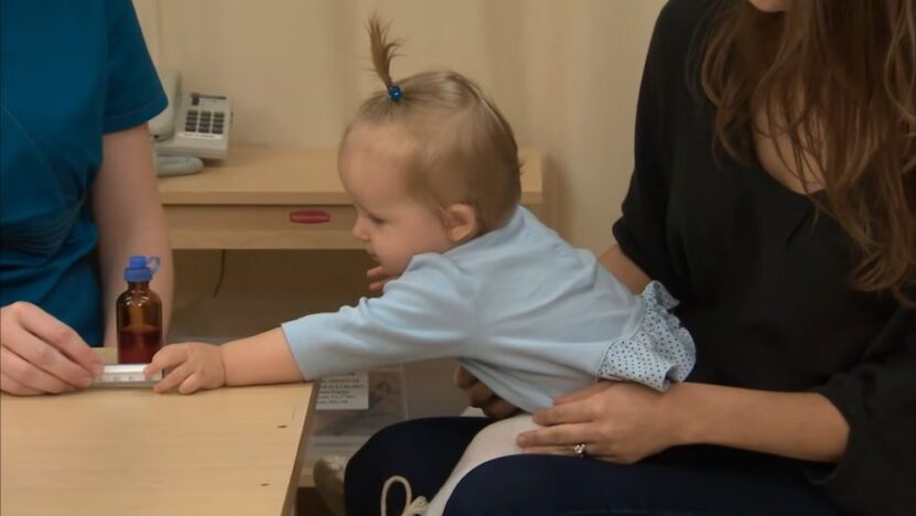 Giving medicine to a child