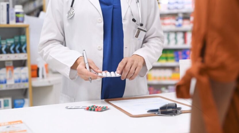 Parents buying a medicine for children